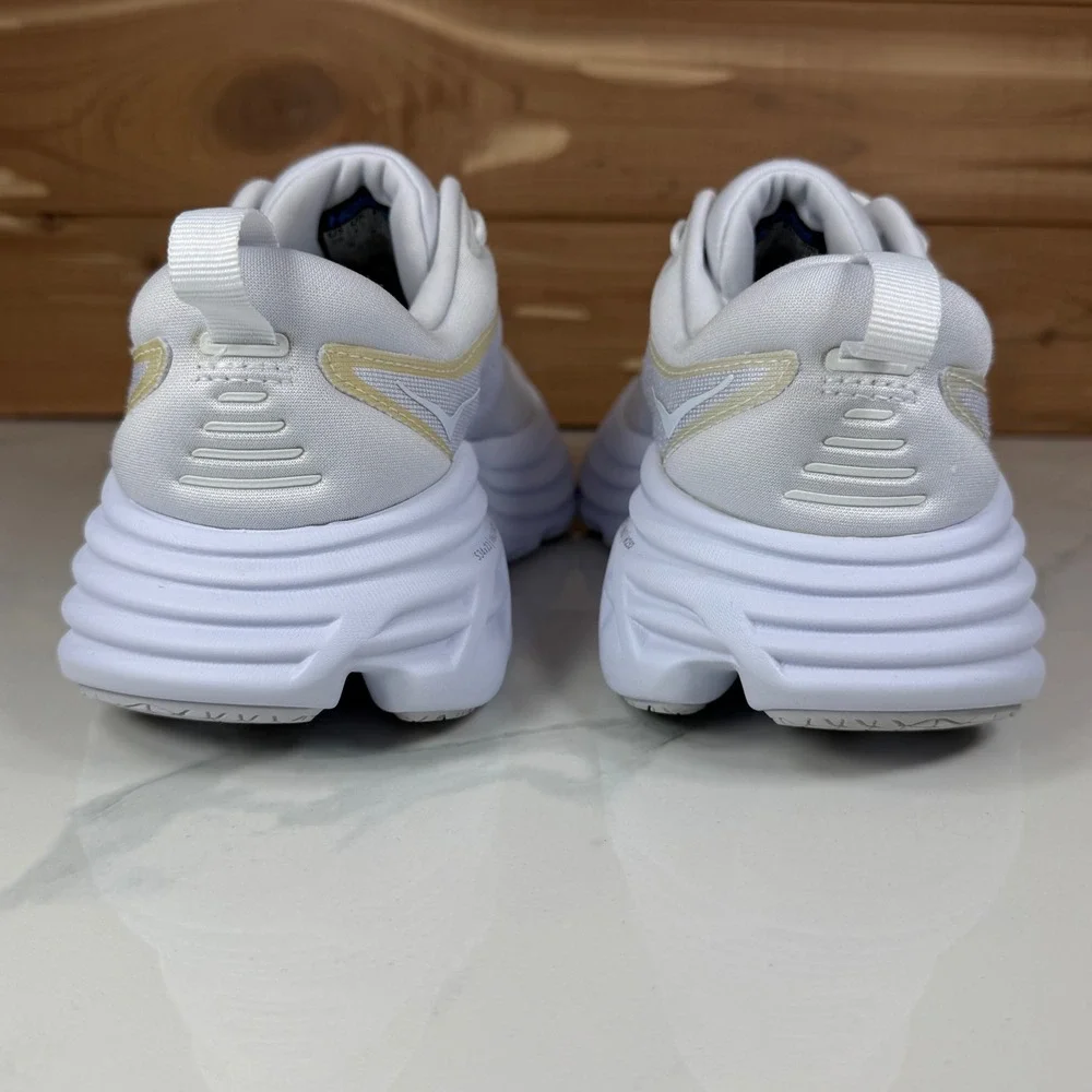 Hoka One One White Athletic Running Shoes with Subtle Gold Trim
